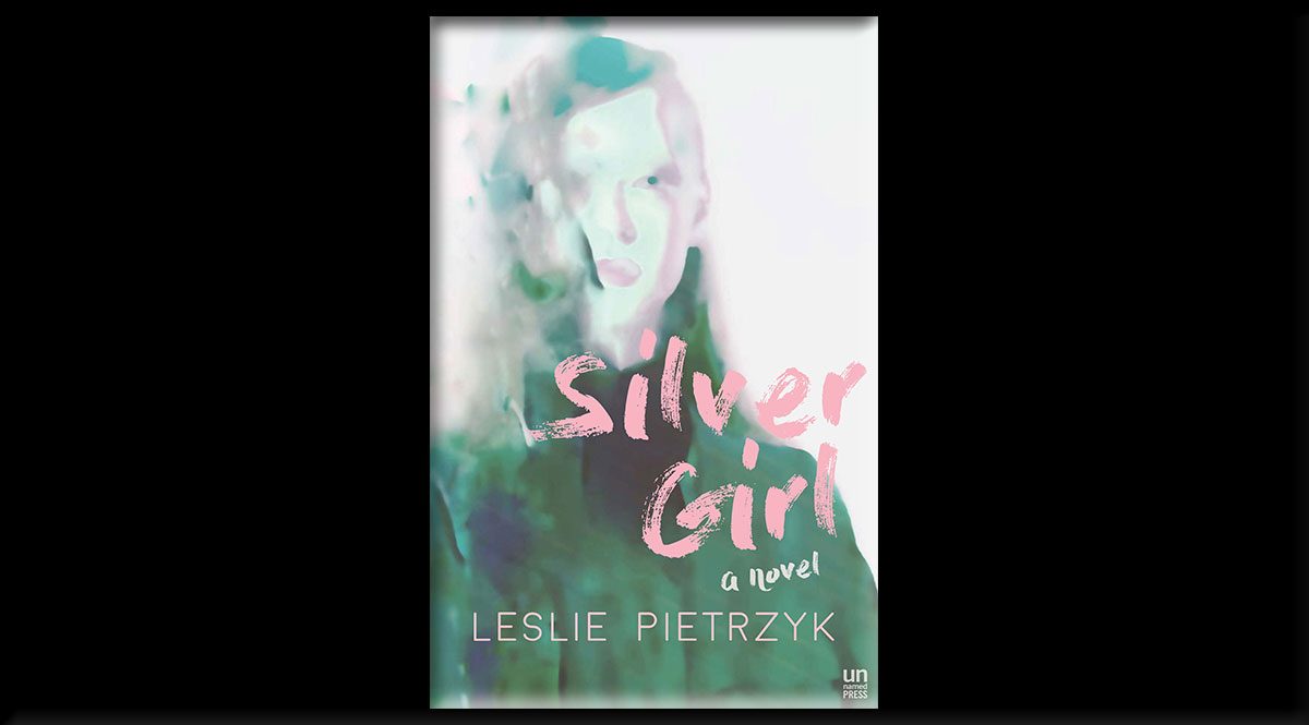 This is the cover of Leslie Pietrzyk's Silver Girl. In the background is a blurred image of a girl.